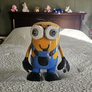Yellow and Blue Cartoon Character Figurine